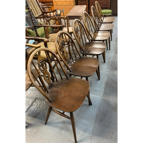 495 - Set of six Ercol elm Windsor Fleur De Leys dining chairs.  (6) (B.P. 21% + VAT)