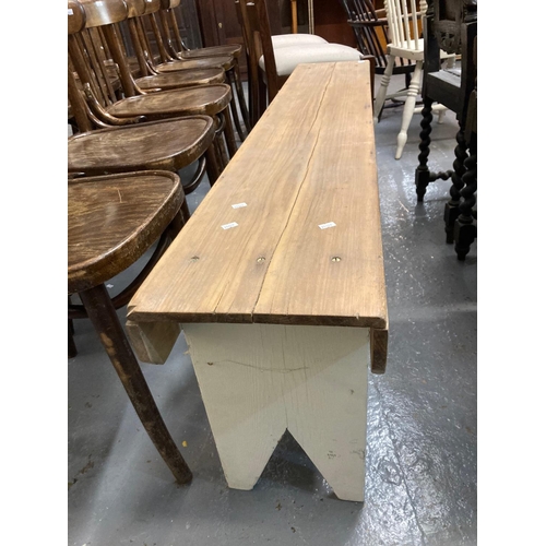 511 - Rustic pine bench with shaped trestle ends.  Length 153cm approx.  (B.P. 21% + VAT)