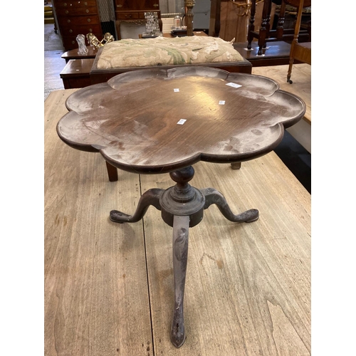 534 - 18th century mahogany tripod side/wine table having dish and shaped top on tripod legs and hoof feet... 