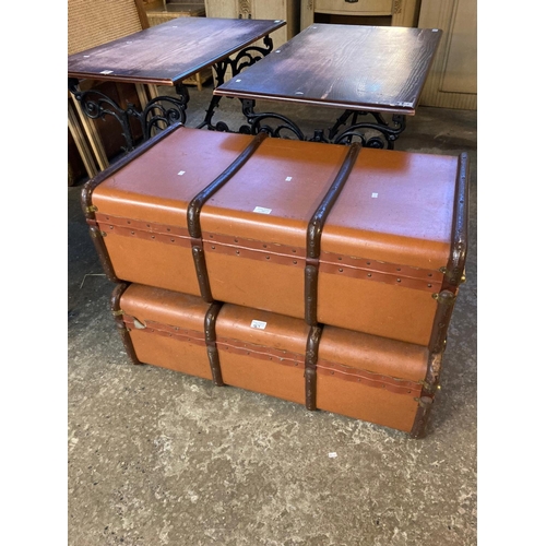 567 - Pair of vintage canvas and wooden banded traveling trunks.  (2)  (B.P. 21% + VAT)