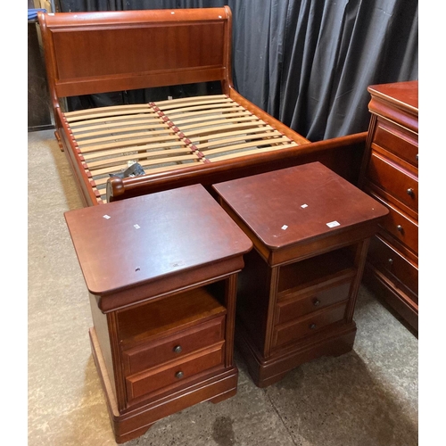 586 - Modern cherry wood bedroom suite comprising: double sleigh bed, pair of bedside cabinets, large ward... 