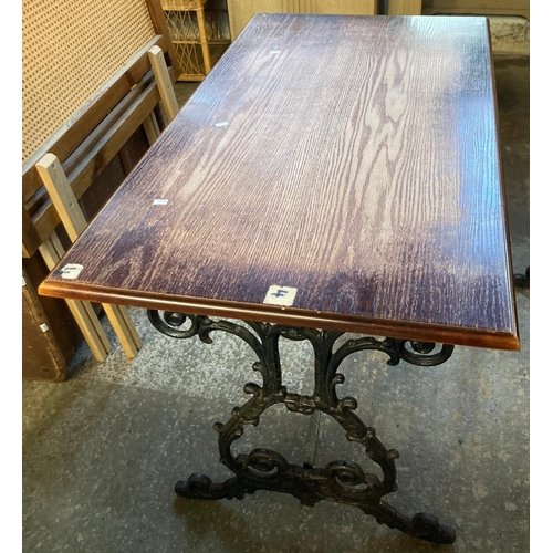 591 - Vintage oak top pub table with ornately scroll decorated cast iron base.   (B.P. 21% + VAT)