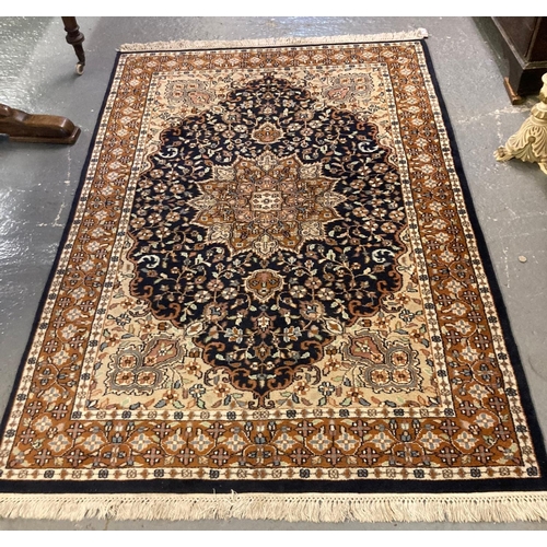 594 - Persian design beige ground floral and foliate carpet with flowerhead boarders.  187x127cm approx.  ... 