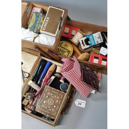 87 - Mid century folding ladies sewing box with accessories together with a small miniature leather suitc... 