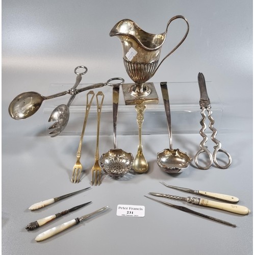 231 - Bag of silver plated spoons, tongs, forks etc.  (B.P. 21% + VAT)