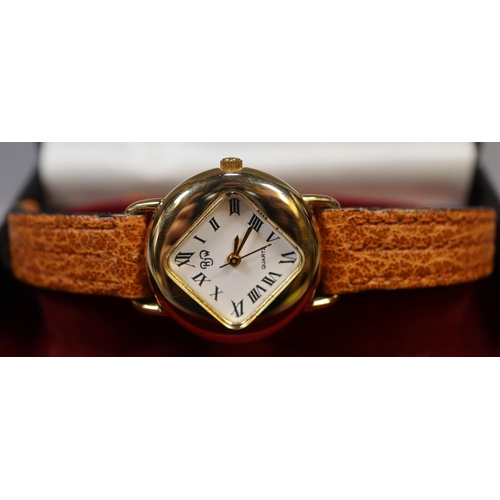 331 - R J W ladies gold plated quartz wristwatch with Roman numerals in original case.  (B.P. 21% + VAT)