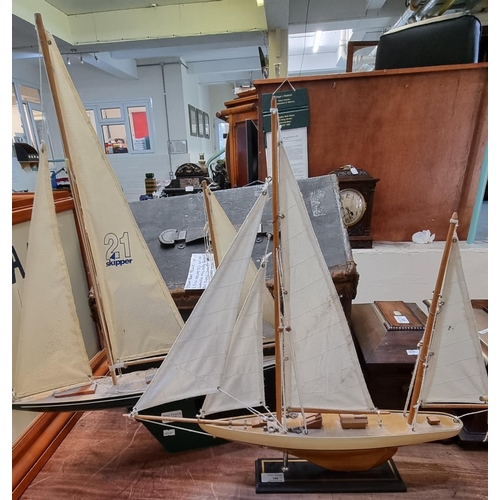 100 - Two models of masted yachts, one marked '21 Skipper' with metal base.  (2)  (B.P. 21% + VAT)