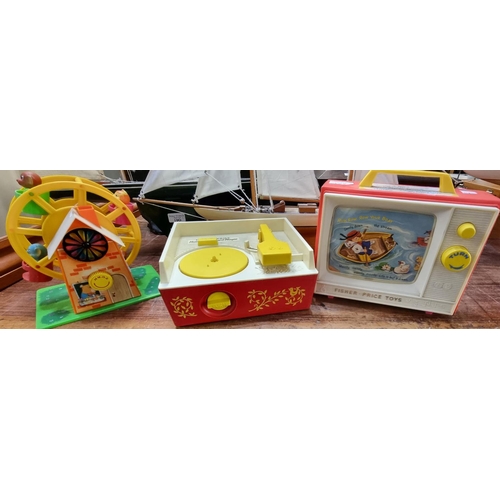 102 - Two vintage Fisher Price toy items, to include: Giant Screen-Music Box TV and a Music Box record pla... 