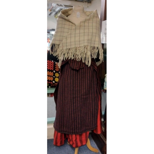 217 - Antique (probably late 19th Century) woollen Welsh costume, comprising: traditional striped begwn/be... 