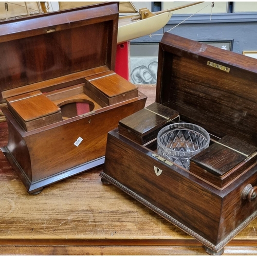 97 - Two 19 century sarcophagus shaped tea caddies in mahogany and rosewood with mother of pearl inlay.  ... 