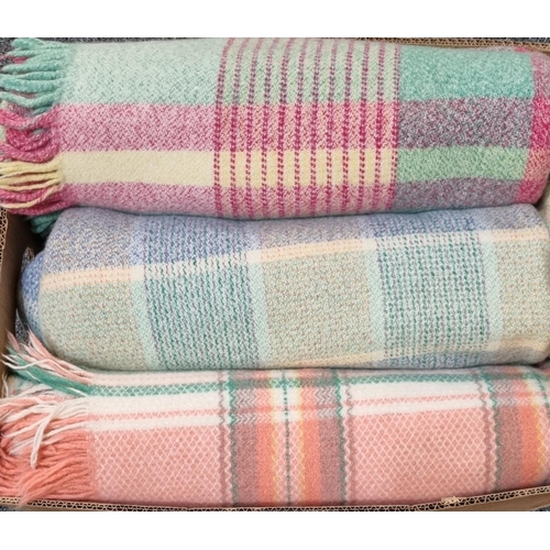 107 - Box of vintage multi-coloured checked fringed edge blankets or carthen; one with Derw product label ... 