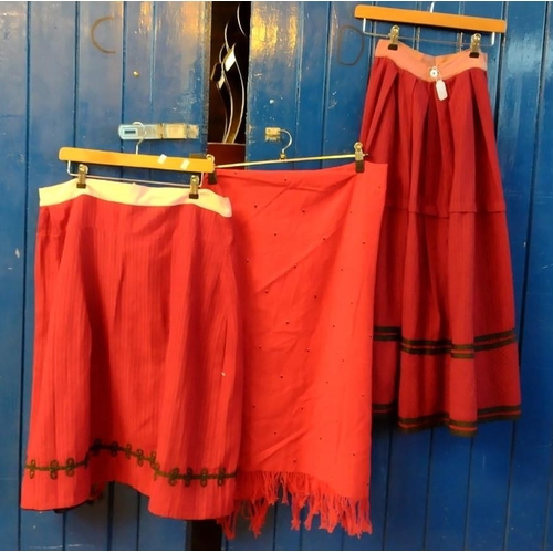 483 - Two traditional woollen antique late 19th Century Welsh costume skirts, both red with stripes but di... 