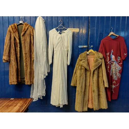 486 - Collection of vintage clothing to include: light brown 3/4 length fur coat, a similar faux fur coat ... 