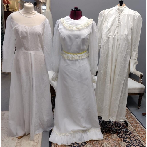 491 - Three vintage full length long sleeve wedding dresses to include: a cream long sleeve chrysanthemum ... 