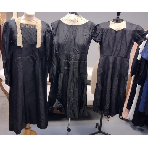 492 - Three vintage 20's-40's black dresses with lace collars; one long sleeve, one with cap sleeves. (3)
... 