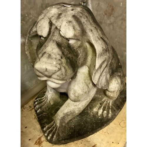 500 - Large weathered marble garden statue in the form of a stylised seated hound dog.  71cm long, 80cm hi... 