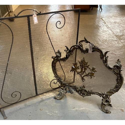 502 - Rococo style and mesh firescreen decorated with cherubs, together with another metal and mesh firesc... 