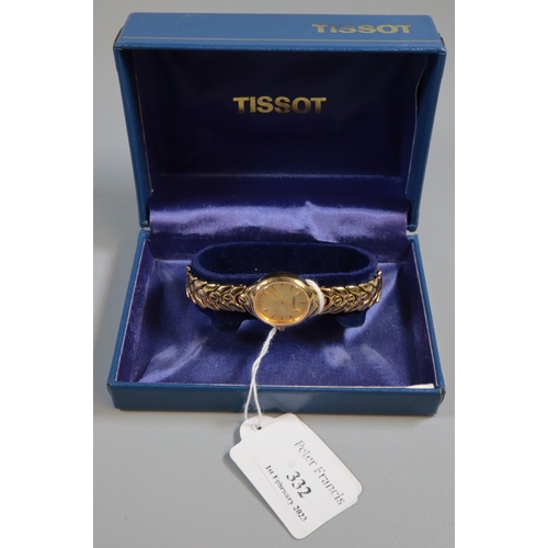 332 - Tissot lady's gold plated wristwatch, appearing in original box, with original receipt.
(B.P. 21% + ... 