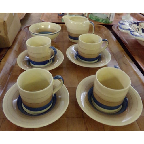 406 - Tray of vintage Susie Cooper part coffee ware: four espresso cups and saucers, sugar bowl and milk j... 