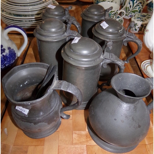 442 - Tray with five pewter lidded beer steins,  another tankard, a pitcher and three teaspoons. (10)
(B.P... 