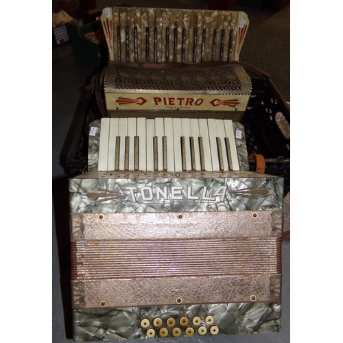 451 - Two vintage piano accordions: a Tonella and a Pietro. 
(B.P. 21% + VAT)