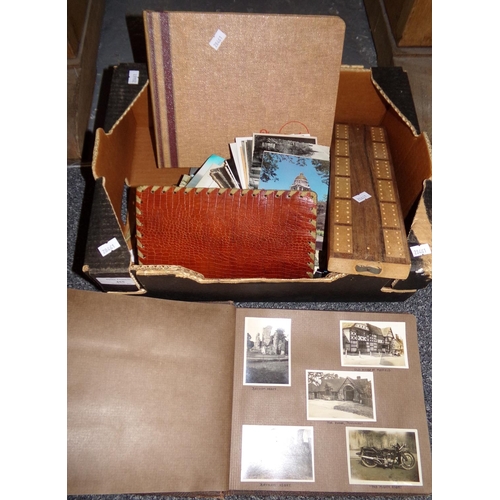 455 - Box containing wooden cribbage board, two photograph albums with black and white photographs, one da... 