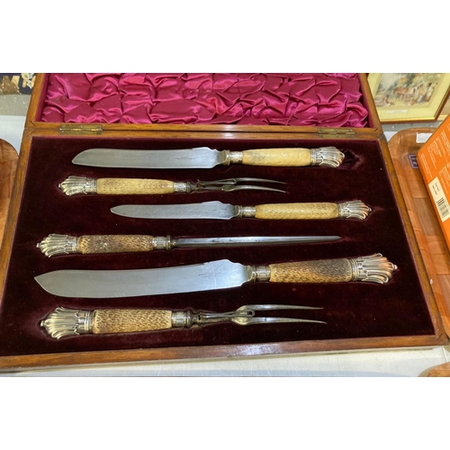 472 - Late probably Victorian six piece oak cased carving set with horn handles and silver mounts.  (B.P. ... 