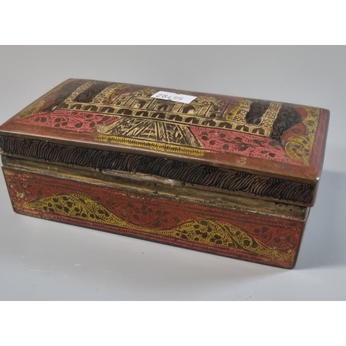 64 - Indian metal box comprising assorted chess pieces with a circular chess board. 
(B.P. 21% + VAT)