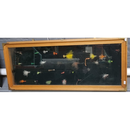 137 - Framed and case montage of assorted fishing flies, various.  87x36cm approx.  (B.P. 21% + VAT)