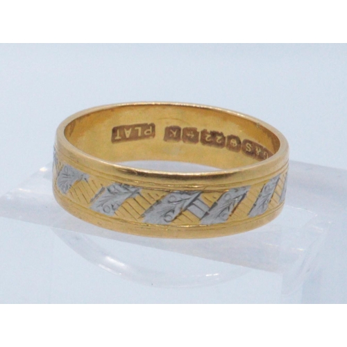 237 - 22ct gold bi-coloured engraved wedding ring. Size L + 1/2, 4.1g approx. 
(B.P. 21% + VAT)