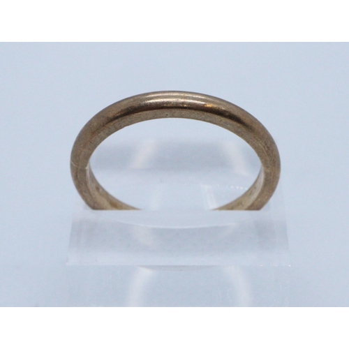 240 - 9ct gold wedding ring. Size T + 1/2, 3.9g approx. 
(B.P. 21% + VAT)