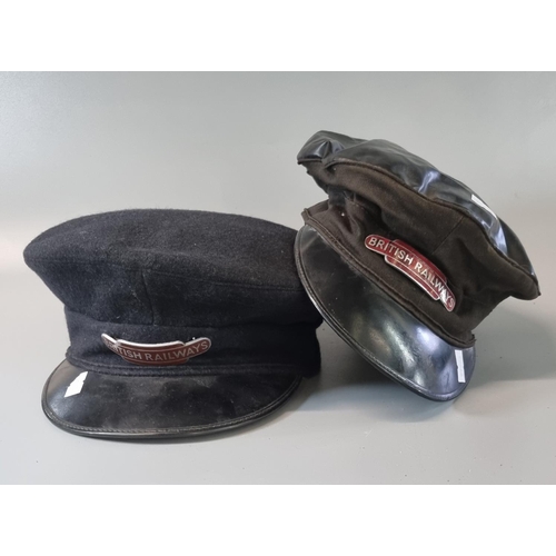 94 - Two British Railway drivers hats, both with original cap badges, dry and wet weather use. 
(B.P. 21%... 