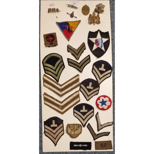 196 - A collection of assorted mainly American military shoulder flashes and insignia; RAF badge, The Wels... 