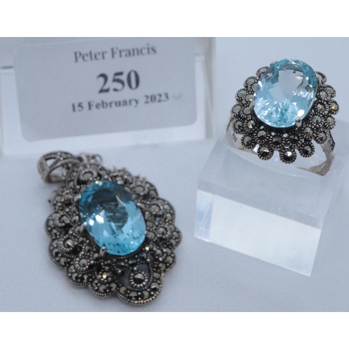 250 - Blue topaz and marcasite dress ring and a similar stone set necklace on chain.
(B.P. 21% + VAT)