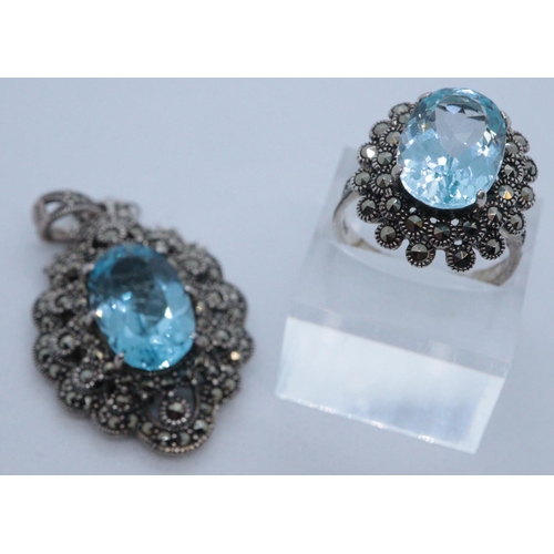 250 - Blue topaz and marcasite dress ring and a similar stone set necklace on chain.
(B.P. 21% + VAT)