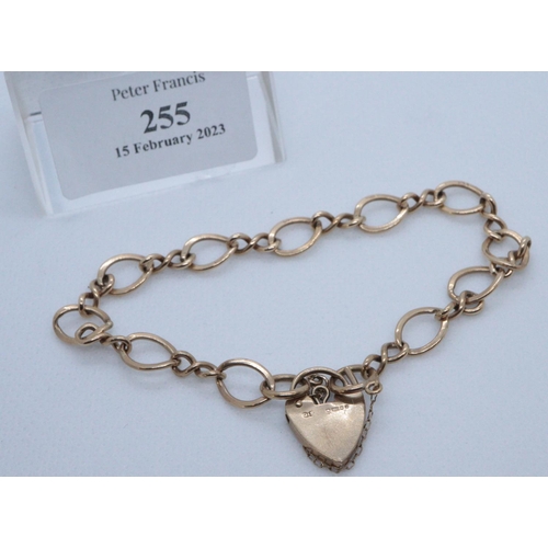 255 - 9ct gold chain bracelet with gold padlock. 9.5g approx.
(B.P. 21% + VAT)