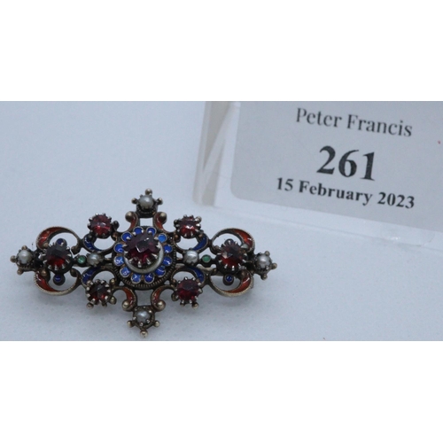 261 - White metal gemset Rococo style enamel brooch.
(B.P. 21% + VAT)