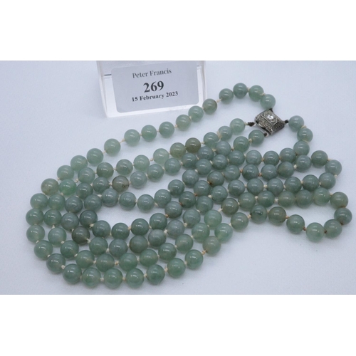 269 - A double strand green hardstone necklace with stone set 800 silver clasp.
(B.P. 21% + VAT)