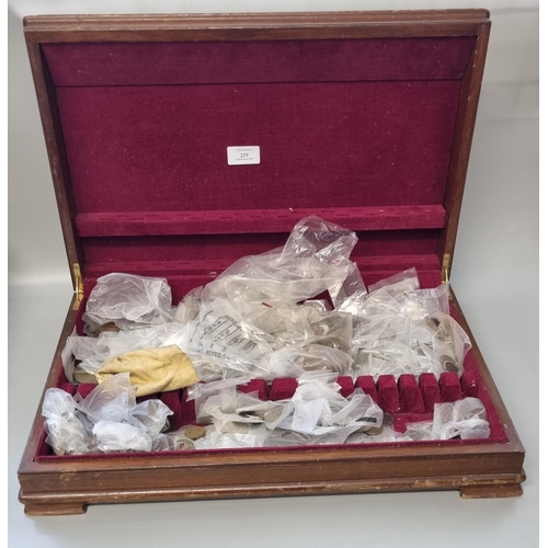 229 - Walnut canteen cutlery box, the interior revealing a large collection of assorted GB and other coins... 