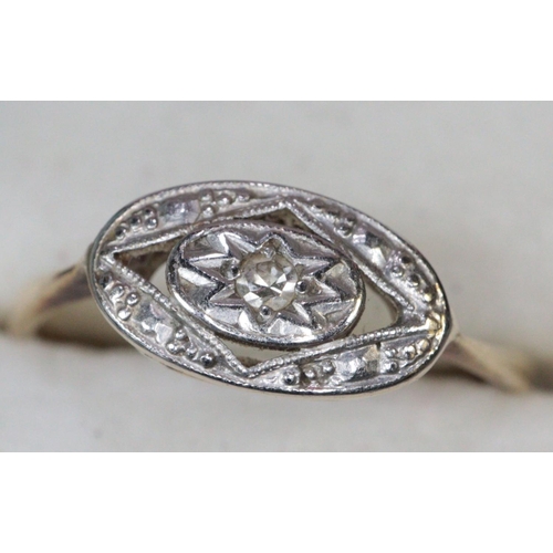 284 - Art Deco design oval gold and platinum dress ring with diamond centre, together with a 9ct gold flow... 