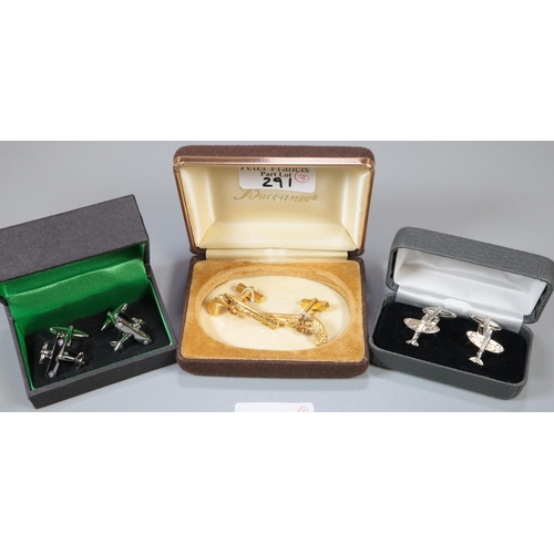 291 - Three pairs of novelty gent's cufflinks to include: Spitfires (silver), Biplanes and gilt flintlock ... 