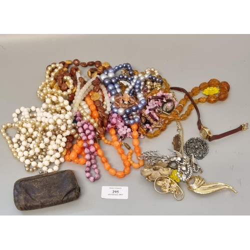 295 - Large collection of costume jewellery items, including: bead necklaces, brooches, small purse etc.  ... 