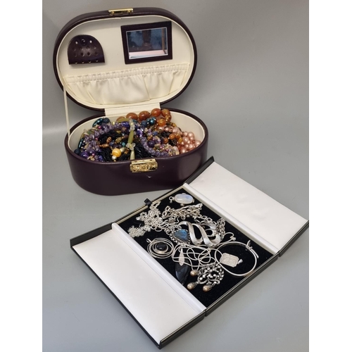 298 - Jewellery box containing large collection of costume jewellery: beads and other items together with ... 