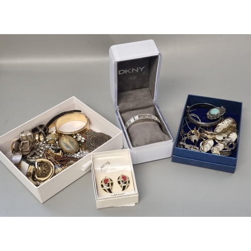 299 - Three small boxes of assorted costume jewellery, various, together with a DKNY ladies marcasite set ... 