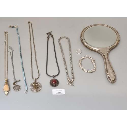 302 - Assorted costume jewellery items, silver backed mirror etc.  (B.P. 21% + VAT)