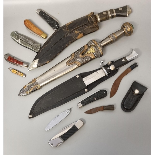 343 - Collection of assorted knives and pocket knives, to include: Kukri, penknives, theatrical knife and ... 