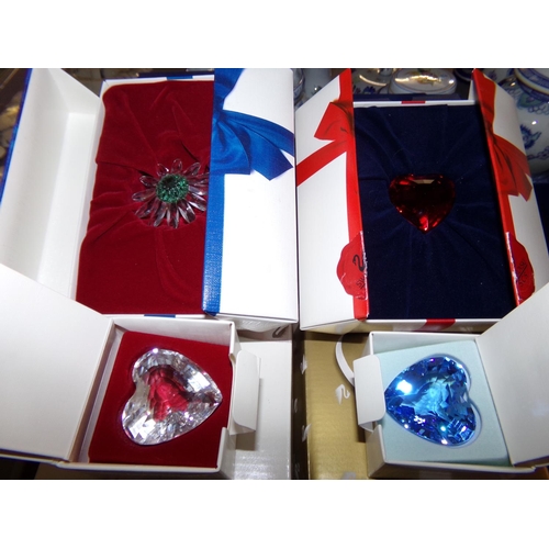 390 - Two trays of Swarovski crystal ornaments and decorations in original boxes: crystal hearts, crystal ... 