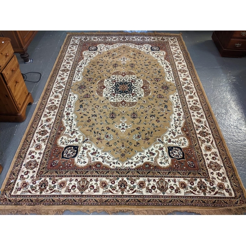 632 - Modern Persian design floral and foliate rug on a beige ground with central flowerhead medallion.  3... 