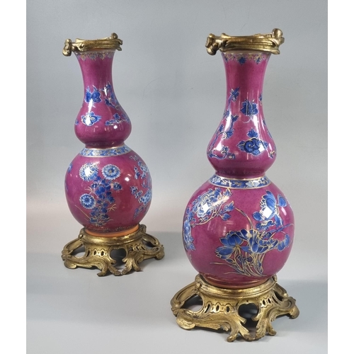 1 - Pair of late 18th/early 19th Century puce ground baluster shaped bottle vases with rococo style ormo...