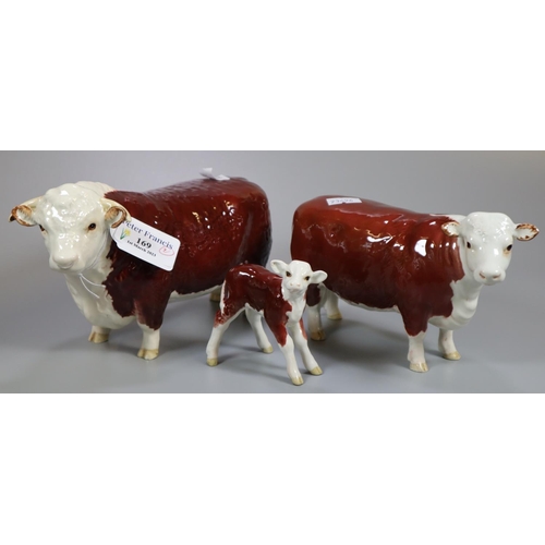 169 - Three Beswick Hereford cattle figures; bull, cow and calf. (2)
(B.P. 21% + VAT)